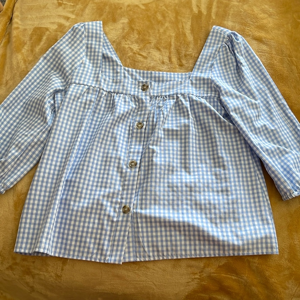 Sunny Leigh woman’s blue checkered blouse